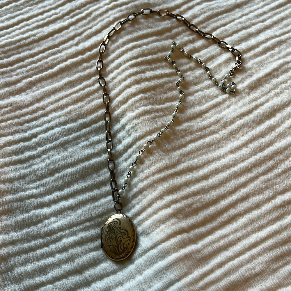 Vintage gold plated locket with inscription “Shirley love Dave”